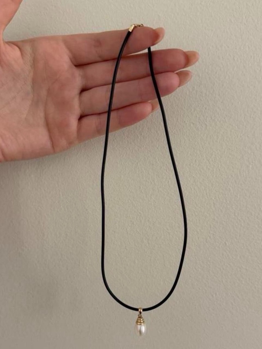 vintage 14K teardrop cultured pearl necklace on black rubber cord - 17”